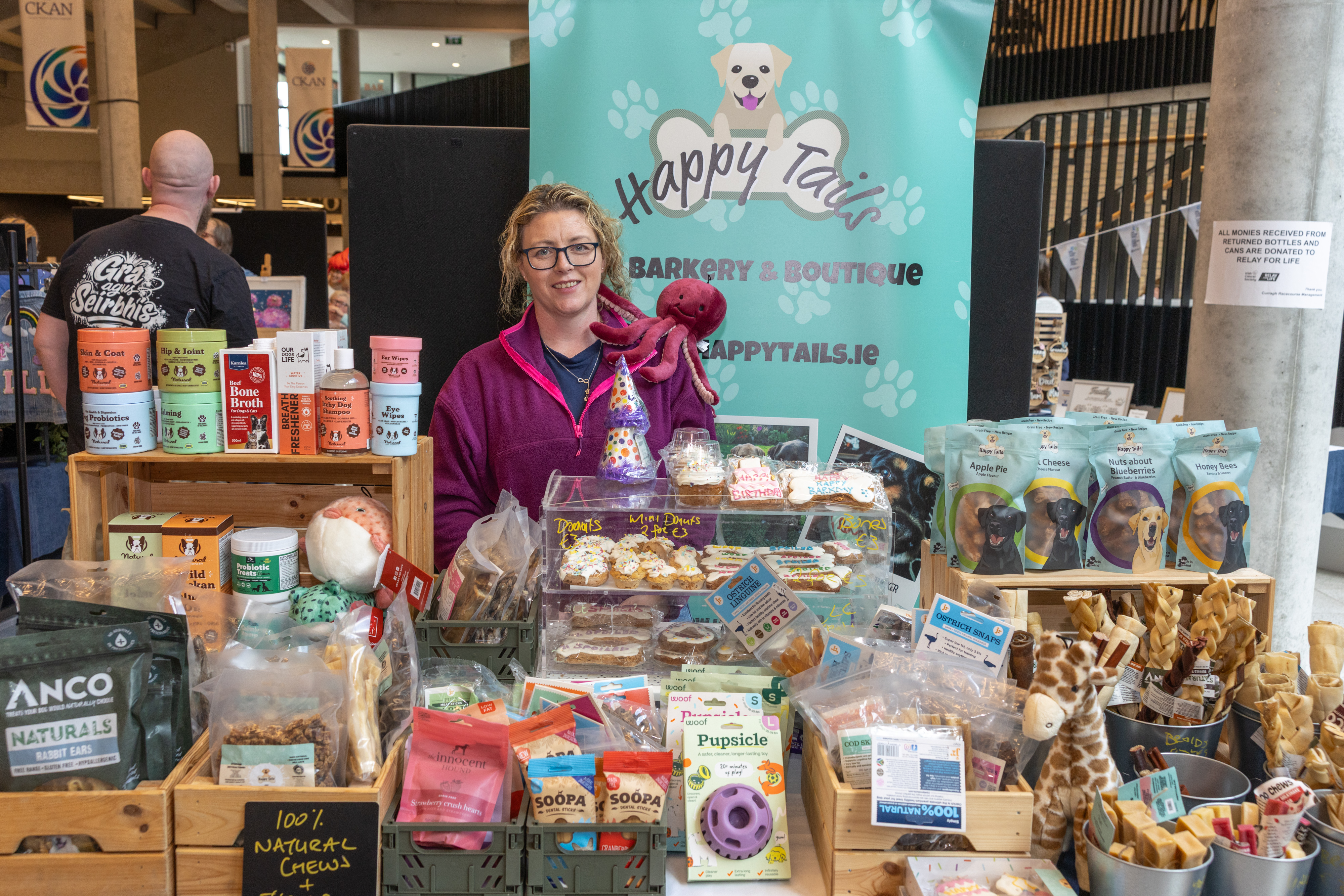 Person with dog treat stall. 